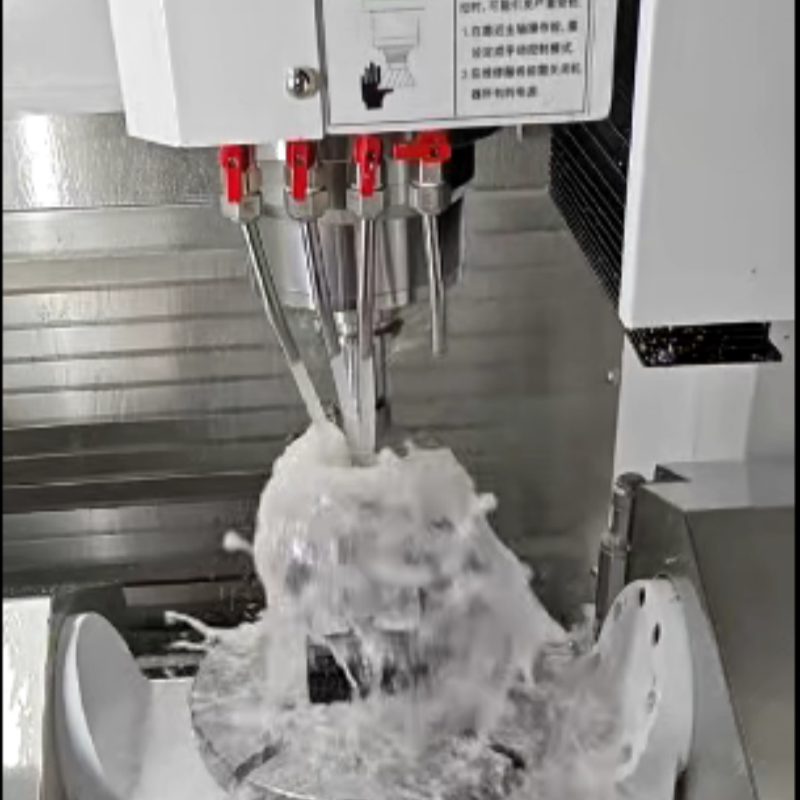 CNC machining center milling complex aluminum housing with coolant flushing
