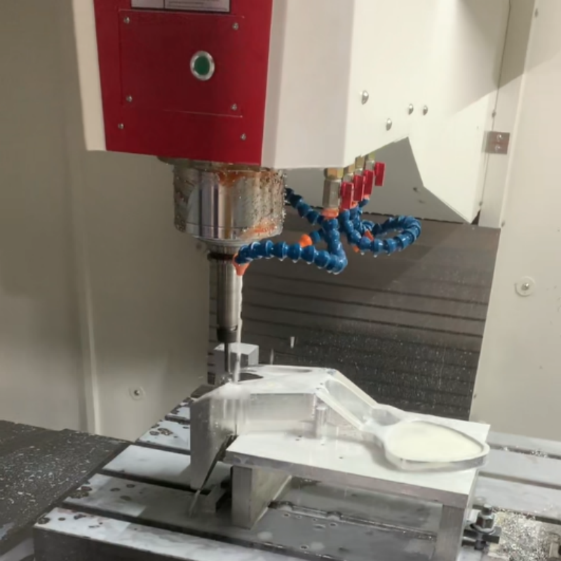 CNC machining center milling complex aluminum profile part with coolant spray